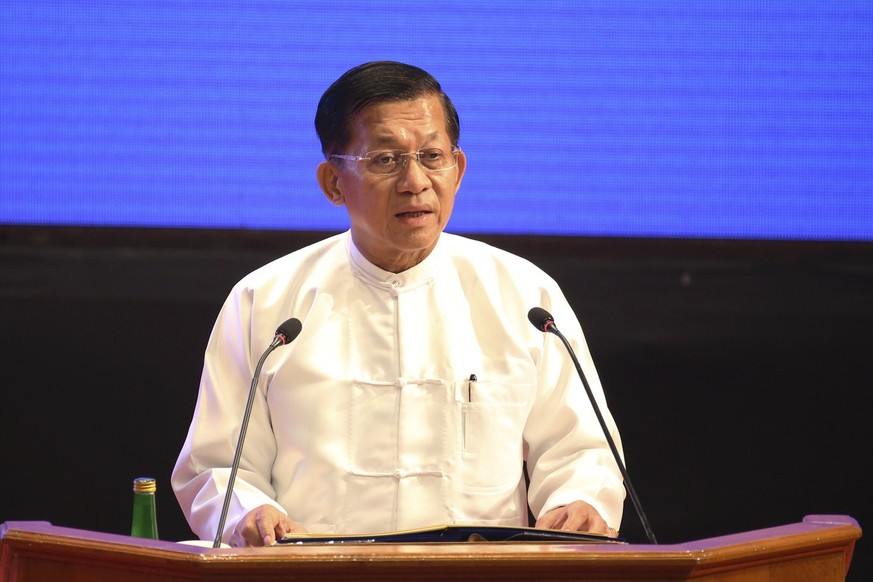 Senior Gen. Min Aung Hlaing, head of the military council, delivers a speech during a ceremony to mark the 8th anniversary of the Nationwide Ceasefire Agreement (NCA) at the Myanmar International Conv ...