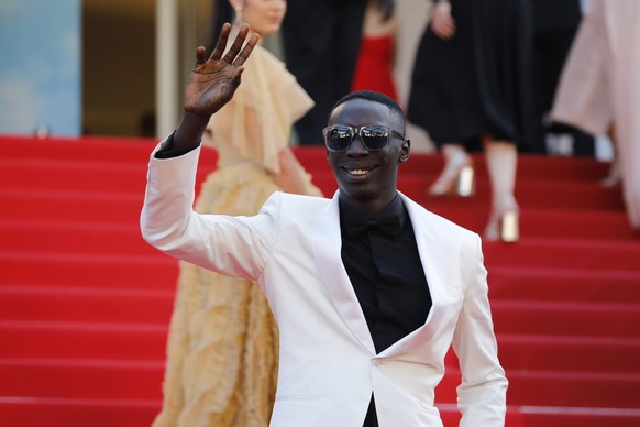 epa09958295 Khaby Lame arrives for the screening of &#039;Armageddon Time&#039; during the 75th annual Cannes Film Festival, in Cannes, France, 19 May 2022. The movie is presented in the Official Comp ...