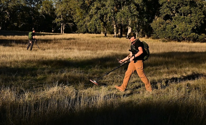 YouTuber Matt James and Cody Blanchard of Heritage Gold Rush use metal detectors to detect gold on October 27, 2025 in El Dorado County, north of Sacramento, California. Matt James has collected gold  ...