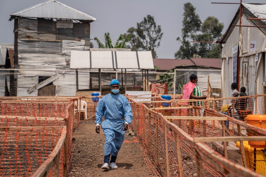 epaselect epa11555393 A medical staff works at the Munigi Health Centre in Munigi, Democratic Republic of the Congo, 19 August 2024. The World Health Organization (WHO) declared a global health emerge ...