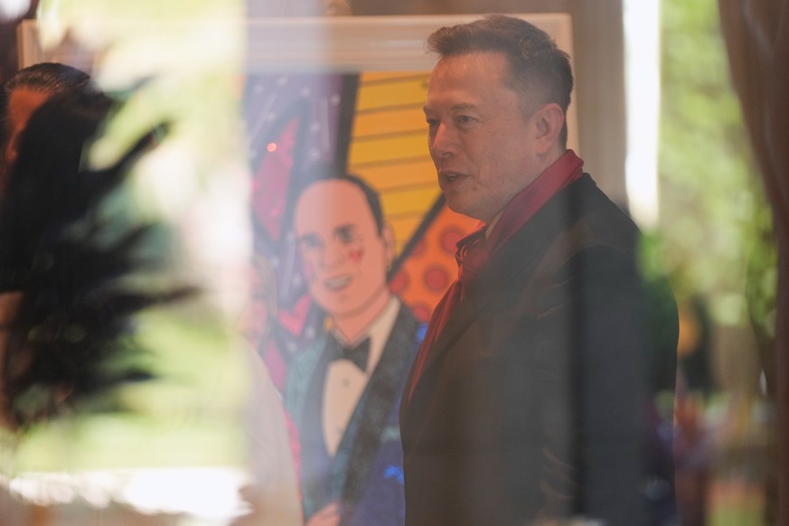 Elon Musk arrives at The Mar-a-Lago Club, Sunday, Feb. 1, 2026, in Palm Beach, Fla., to attend the wedding of White House deputy chief of staff Dan Scavino and Erin Elmore, the director of Art in Emba ...