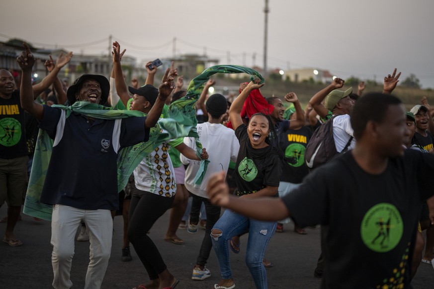 MK Party supporters dance in the middle of the street in Mahlbnathini village in rural KwaZulu-Natal, South Africa, on Thursday May 30, 2024. MK Party is currently leading in the provincial poll again ...