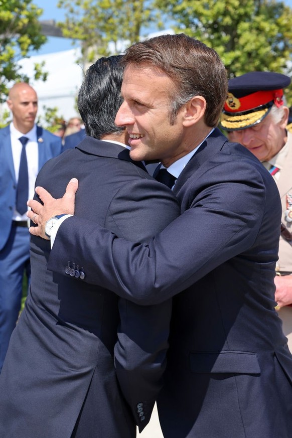VER-SUR-MER, FRANCE - JUNE 06: Prime Minister of the United Kingdom Rishi Sunak and President of France, Emmanuel Macron attend the UK Ministry of Defence and the Royal British Legion’s commemorative ...