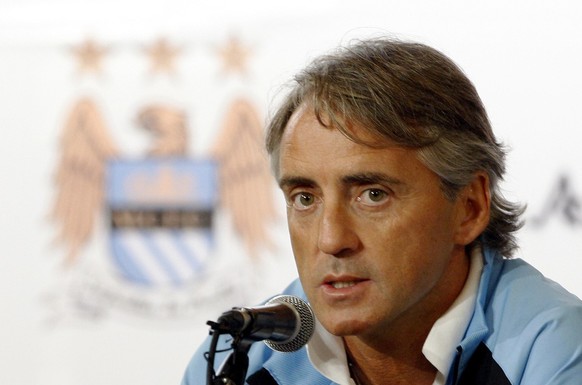 Manchester City manager Roberto Mancini speaks during a press conference in Kuala Lumpur, Malaysia, Saturday, July 28, 2012. Manchester City will play against Malaysia XI, a Malaysia League selection, ...