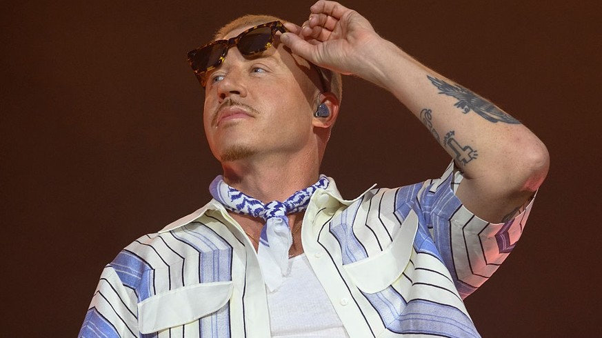 PARIS, FRANCE - JULY 19: American rapper Macklemore performs live on stage during the 5th Lollapalooza Paris Festival on July 19, 2025 in Paris, France. (Photo by Kristy Sparow/Getty Images)