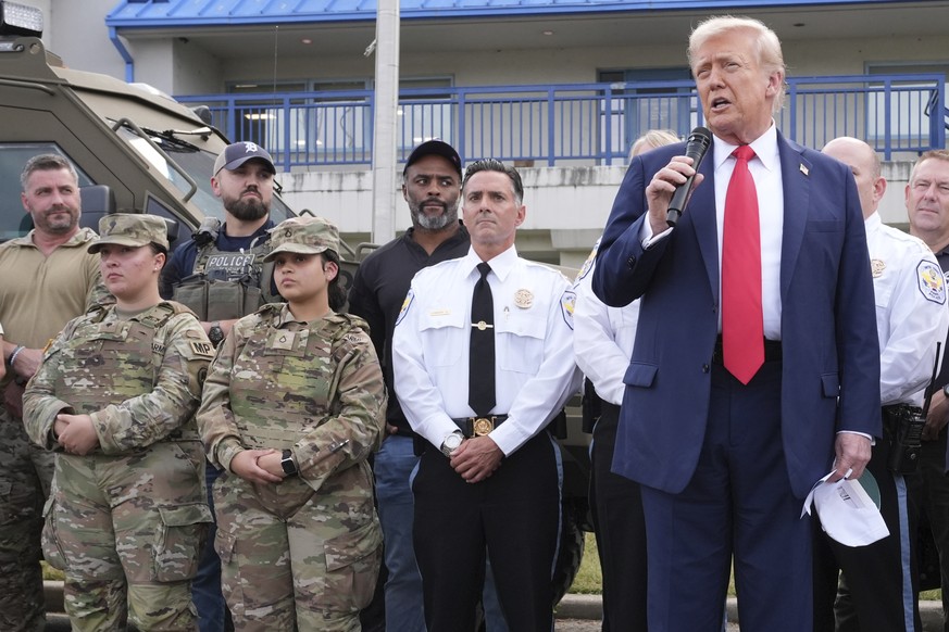 President Donald Trump speaks with members of law enforcement and National Guard soldiers, Thursday, Aug. 21, 2025, in Washington. (AP Photo/Jacquelyn Martin)
Trump District of Columbia