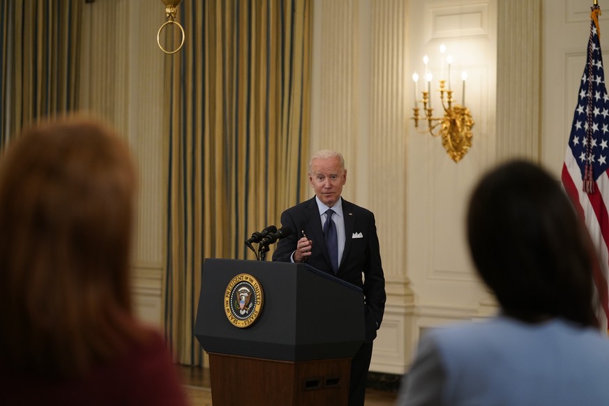 epa09177817 US President Joe Biden takes questions after delivering remarks on the Covid-19 response and the vaccination program, from the State Dining Room of the White House in Washington, DC, USA 0 ...