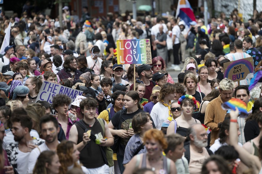 epa11412125 People take part in the Zurich Pride parade as part of Zurich Pride Festival 2024 in Zurich, Switzerland, 15 June 2024. June is celebrated around the world as the Pride Month. EPA/CHRISTIA ...