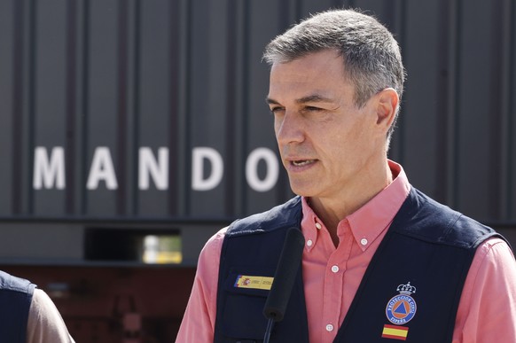 epa13139062 Spain's Prime Minister Pedro Sanchez addresses a press conference as he visits the Forward Command Post in Navalcarnero, Madrid, Spain, 29 July 2026, near the area affected by the wil ...
