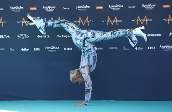 epa10614177 The entry from Iceland, Dilja arrives on the Turquoise Carpet for the Opening Ceremony of the 67th annual Eurovision Song Contest (ESC) at The Walker Art Gallery in Liverpool, Britain, 07  ...