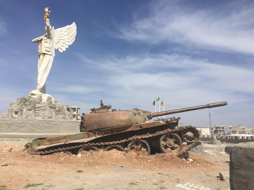 epa05875792 A photograph made available on 28 March 2017 showing destroyed military hadware amongst the rubble in Kobani, the Kurdish region in the Aleppo Governorate in northern Syria, 26 March 2017. ...