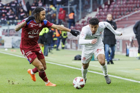 Servette&#039;s defender Kevin Mbabu, left, fights for the ball with Winterthur&#039;s midfielder Sayfallah Ltaief, right, during the Super League soccer match of Swiss Championship between Servette F ...