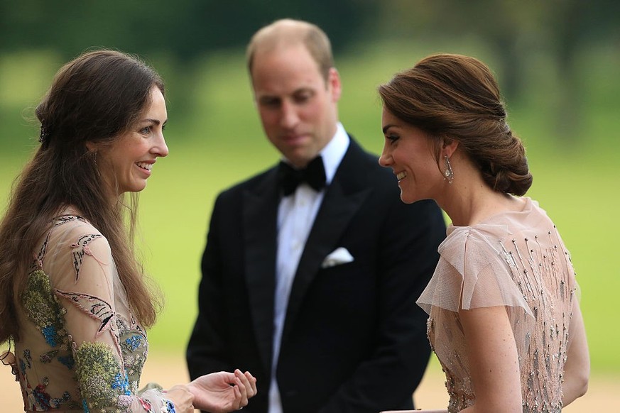 KING&#039;S LYNN, ENGLAND - JUNE 22: HRH Prince William and Catherine, Duchess of Cambridge are greeted by Rose Cholmondeley, the Marchioness of Cholmondeley as they attend a gala dinner in support of ...