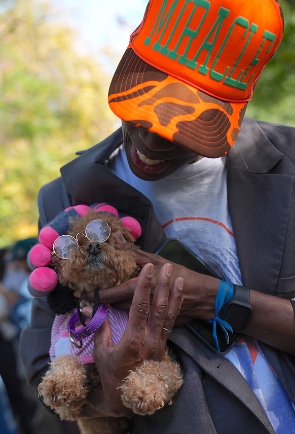 NEW YORK, UNITED STATES - OCTOBER 19: Dog owners in New York City are participating in the Tompkins Square Halloween Dog Parade, dressing their furry friends in colorful costumes on Sunday, October 19 ...