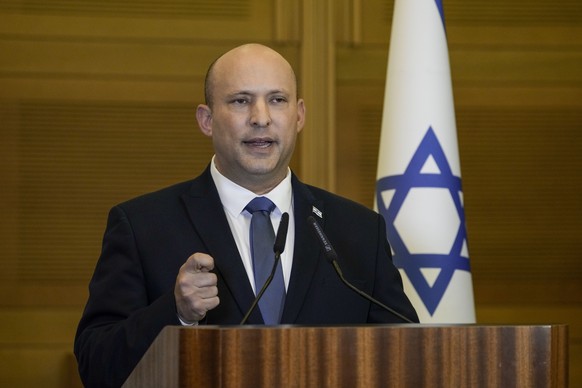 FILE - Israeli Prime Minister Naftali Bennett delivers a statement at the Knesset, Israel&#039;s parliament, in Jerusalem on June 29, 2022. Bennett, a former Israeli prime minister who served briefly  ...