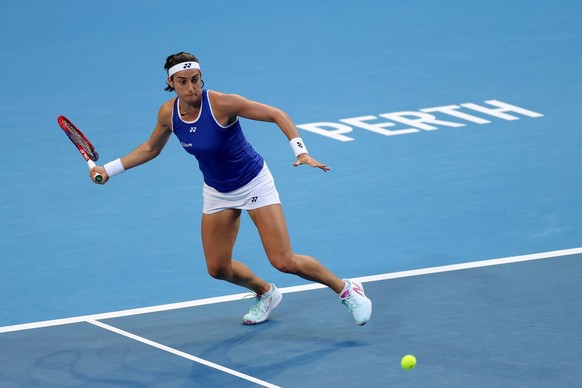 epa10382533 Caroline Garcia of France in action against Nadia Podoroska of Argentina during the 2023 United Cup tennis match between France and Argentina at RAC Arena in Perth, Australia, 30 December  ...