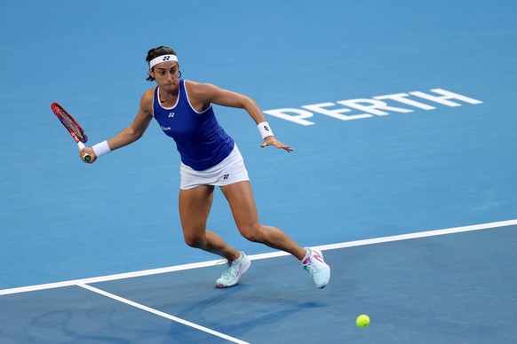 epa10382533 Caroline Garcia of France in action against Nadia Podoroska of Argentina during the 2023 United Cup tennis match between France and Argentina at RAC Arena in Perth, Australia, 30 December  ...