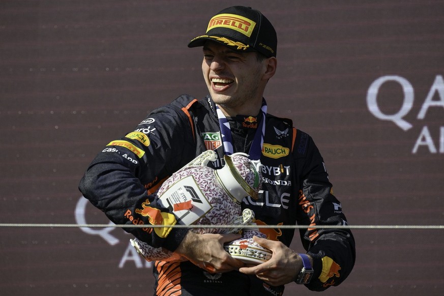 epa10764461 Red Bull driver Max Verstappen of the Netherlands celebrates on the podium after winning the Hungarian Formula One Grand Prix at the Hungaroring circuit, in Mogyorod, near Budapest, Hungar ...