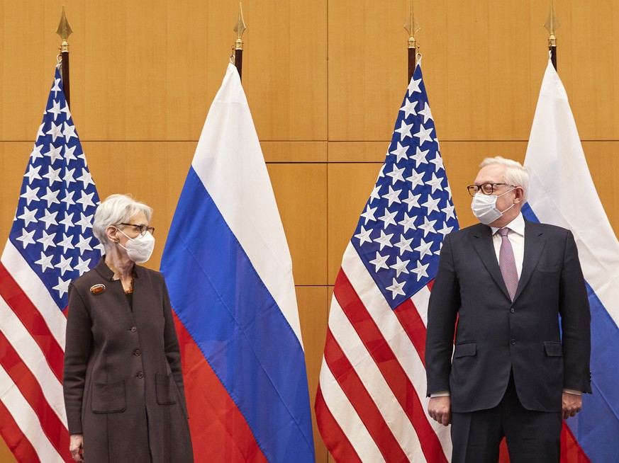 US Deputy Secretary of State Wendy Sherman, left, and Russian deputy foreign minister Sergei Ryabkov attend security talks at the United States Mission in Geneva, Switzerland, Monday, Jan. 10, 2022. ( ...