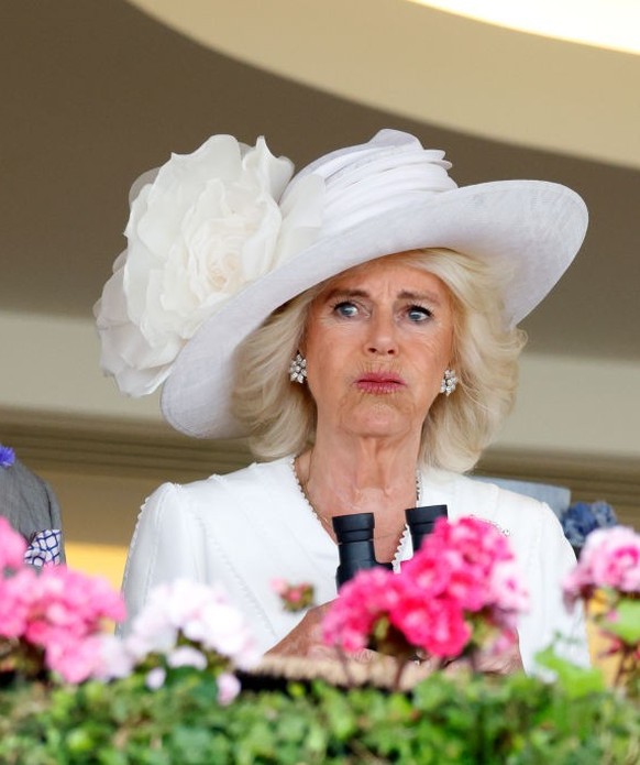 ASCOT, UNITED KINGDOM - JUNE 20: (EMBARGOED FOR PUBLICATION IN UK NEWSPAPERS UNTIL 24 HOURS AFTER CREATE DATE AND TIME) King Charles III and Queen Camilla watch, from the Royal Box, their horse &#039; ...