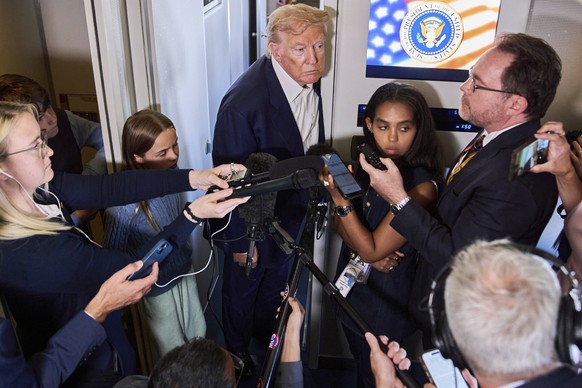 President Donald Trump speaks with reporters aboard Air Force One after leaving Aberdeen, Scotland, Tuesday, July 29, 2025, en route to Washington. (AP Photo/Jacquelyn Martin)
Donald Trump