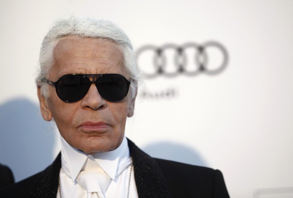 Designer Karl Lagerfeld arrives for the amfAR Cinema Against AIDS benefit at the Hotel du Cap-Eden-Roc, during the 63rd Cannes international film festival, in Cap d&#039;Antibes, southern France, Thur ...