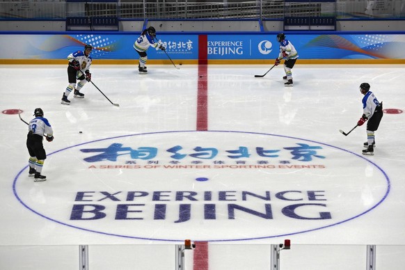 Capital Institute hockey team players practice at the ice hockey venue for the 2022 Beijing Winter Olympics during a test event at the National Indoor Stadium in Beijing, Thursday, April 1, 2021. Chin ...