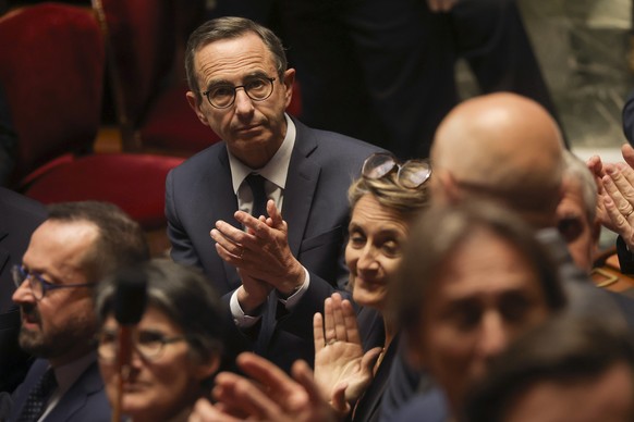 epa12138878 French Interior Minister Bruno Retailleau (L) attends a session at the French National Assembly in Paris, France, 27 May 2025. The French parliament is expected to vote on bills about pall ...