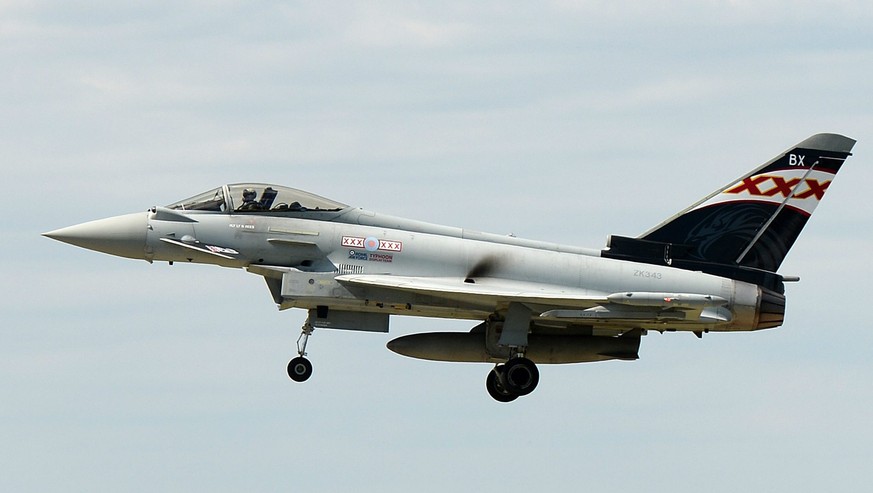 epa04315787 The Eurofighter Typhoon fighter jet flies at the Farnborough Airshow in Farnborough, Hampshire, south east England, 14 July 2014. The theme of 2014 Farnborough Airshow is 100 years of avia ...