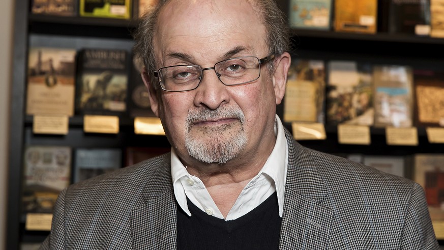 FILE - Author Salman Rushdie appears at a signing for his book &quot;Home&quot; in London on June 6, 2017. Rushdie was attacked while giving a lecture in western New York. An Associated Press reporter ...