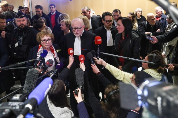 epa10576871 French lawyer Alain Jakubowicz (C) and President of the association Entraide et Solidarite AF447 (Cooperation and Solidarity AF447), Danielle Lamy (L) talk to the press on the verdict&#039 ...