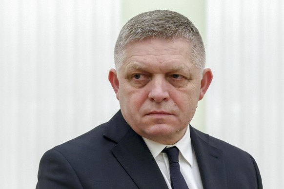 Slovak Prime Minister Robert Fico stands waiting the meeting with Russian President Vladimir Putin at the Kremlin in Moscow, Russia, Sunday, Dec. 22, 2024. (Artyom Geodakyan, Sputnik, Government Pool  ...