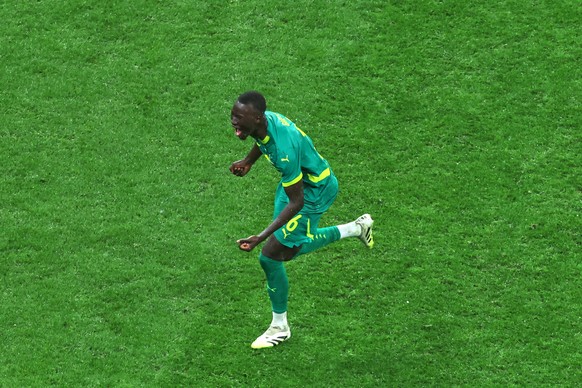 Senegal's Pape Gueye celebrates after winning the Africa Cup of Nations final soccer match between Senegal and Morocco in Rabat, Morocco, Sunday, Jan. 18, 2026. (AP Photo/Youssef Loulidi)
Pape Gu ...