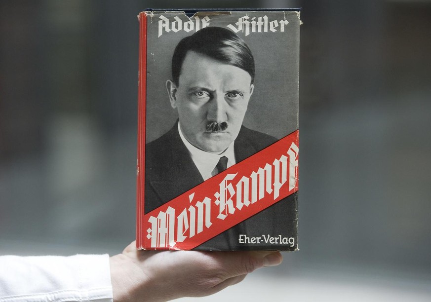 Adolf Hitler&#039;s infamous memoir &quot;Mein Kampf&quot; is presented during a news conference in Nuremberg, southern Germany, Tuesday, April 24, 2012. The state of Bavaria that owns the copyrights  ...