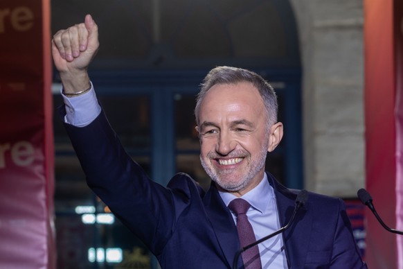 epa12842665 Emmanuel Gregoire, candidate for the Socialist Party (PS) and the left-wing coalition in the 2026 Paris municipal elections, celebrates with supporters after exit polls showed he was leadi ...