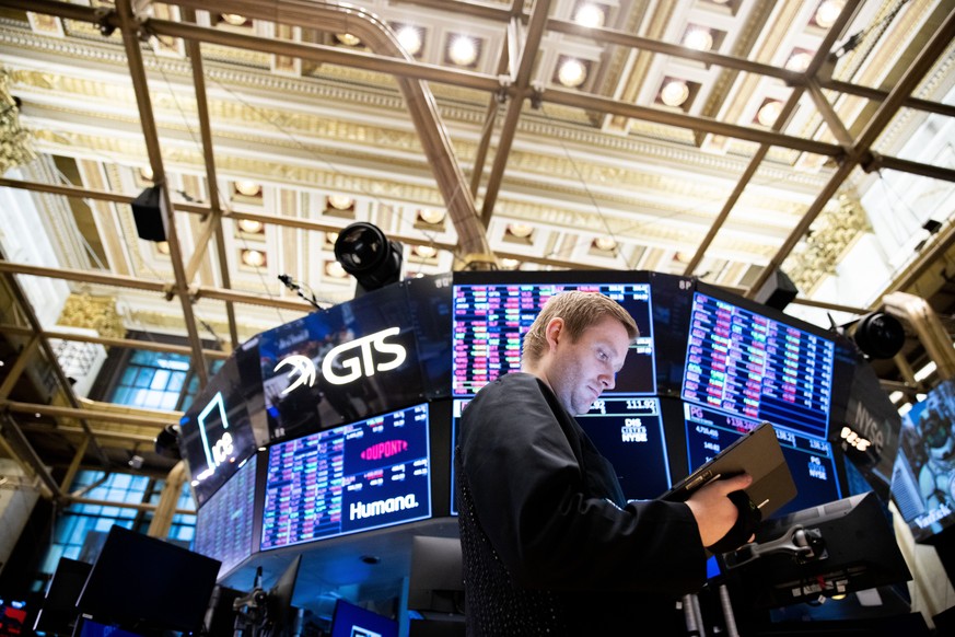 FILE - Traders work on the floor of the New York Stock Exchange on Tuesday, Sept. 13, 2022. A rare bear market in bonds hasn