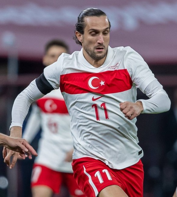 Yusuf Yazici of Turkey competes for the ball with Botond Balogh of Hungary during the friendly match at Puskas Ar