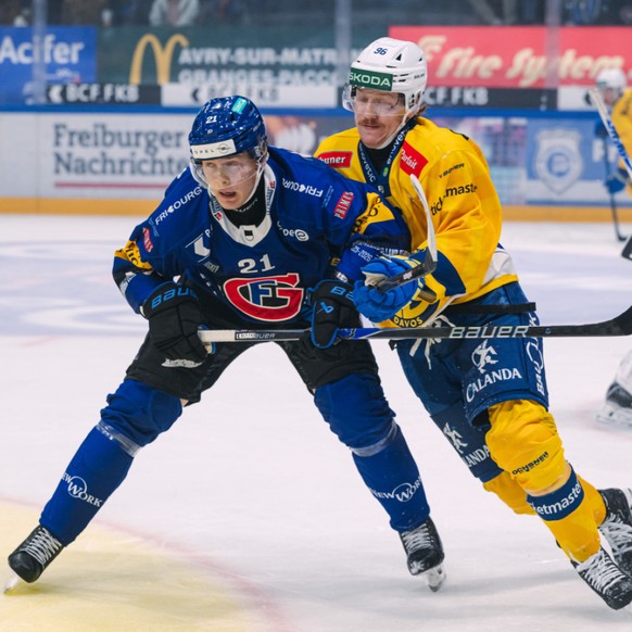 Borgström (à gauche) et Gottéron ont fait tomber le leader Davos vendredi