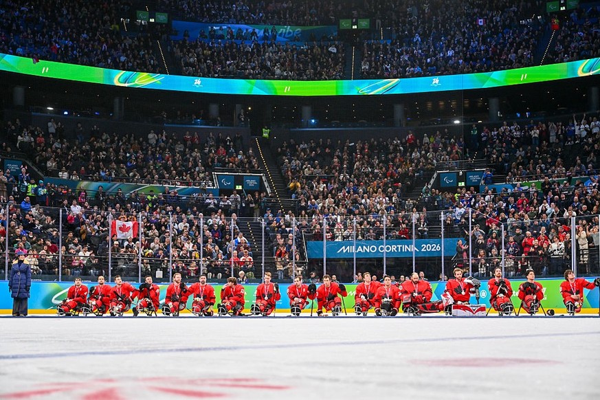 MILAN, ITALY - MARCH 15: Silver medallists Team Canada look dejected after receiving their medals during the medal ceremony for the Para Ice Hockey Open Team Tournament on day nine of the Milano Corti ...