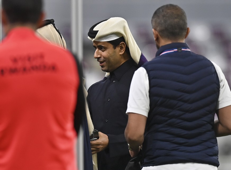 epa10414314 President of Paris Saint-Germain Nasser Al Khelaifi (C) attends a training session for Qatar Winter Tour 2023 at Khalifa International Stadium in Doha, Qatar, 18 January 2023. PSG will fac ...