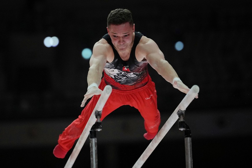 Noe Seifert of Switzerland competes in the Men's All-Around Final during the 53rd Artistic Gymnastics World Championships in Jakarta, Indonesia, Wednesday, Oct. 22, 2025. (AP Photo/Dita Alangkara ...