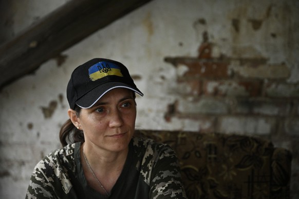 Arina, 23, civilian, who prepares to join the army poses for a photograph during an AFP interview in an undisclosed location in Ukraine on June 7, 2026, amid the Russian invasion of Ukraine. At the en ...