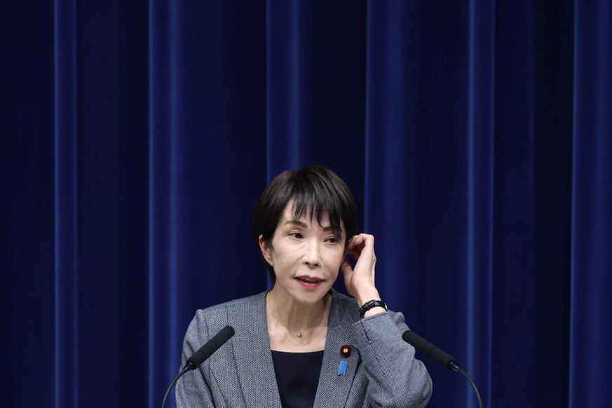 epa12597800 Japan's Prime Minister Sanae Takaichi looks on during a news conference at the Prime Minister's Office in Tokyo, Japan, 17 December 2025. EPA/KIYOSHI OTA / POOL