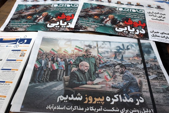 epa12886773 A stack of copies of the Iranian daily newspapers Hamshahri (below), featuring a picture of Iranian Parliament Speaker Mohammad Bagher Ghalibaf (L) and US Vice President JD Vance and carry ...