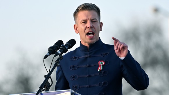 epa12822354 President of the opposition Tisza Party, Peter Magyar addresses his supporters during the National March in Budapest, Hungary, 15 March 2026, on the occasion of the national holiday to mar ...