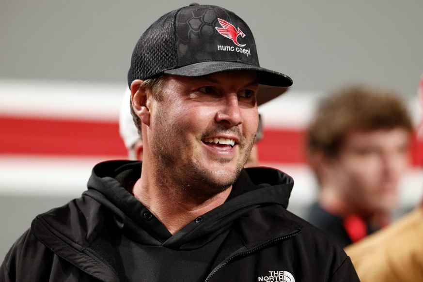 RALEIGH, NORTH CAROLINA - NOVEMBER 29: Former NC State quarterback Philip Rivers attends the game between the North Carolina Tar Heels and the NC State Wolfpack at Carter-Finley Stadium on November 29 ...