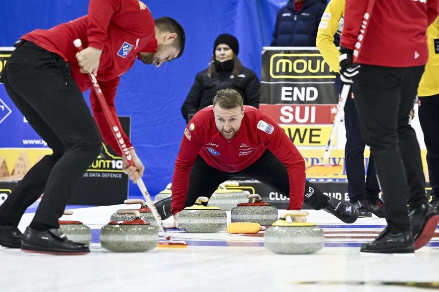 From left, Pablo Lachat-Couchepin and Yannick Schwaller of Switzerland compete during the Men&#039;s Gold Medal Game against Sweden at the Le Gruyere AOP European Curling Championships in Lohja,, Finl ...