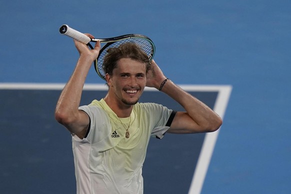 Alexander Zverev, of Germany, reacts after defeating Karen Khachanov, of the Russian Olympic Committee, in the men&#039;s single gold medal match of the tennis competition at the 2020 Summer Olympics, ...