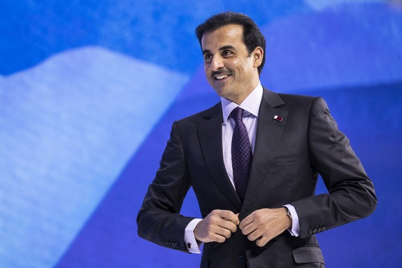 Tamim Bin Hamad Bin Khalifa Al Thani, Emir of the State of Qatar, enters the stage to address a plenary session during the 51st annual meeting of the World Economic Forum, WEF, in Davos, Switzerland,  ...