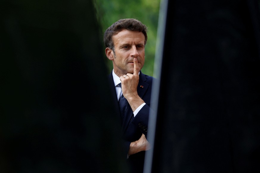 epa09938068 French President Emmanuel Macron arrives to attend a ceremony to mark the abolition of slavery and to pay tribute to the victims of slave trade, at the Luxembourg Gardens in Paris, France, ...